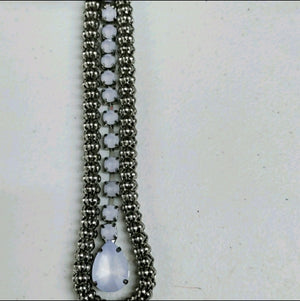 Silver long neck fabric necklace